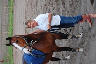 Kindercoach Wilfreda met haar paard Rolin